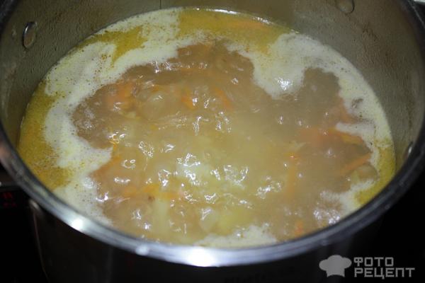 Суп с пельменями на курином бульоне фото
