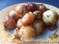 Фото к рецепту: Молодой картофель, жаренный с чесноком и укропом