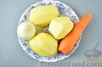 Фото приготовления рецепта: Куриное филе в картофельно-морковной 