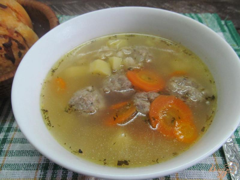 Фото приготовление рецепта: Перловый суп с фрикадельками шаг №8