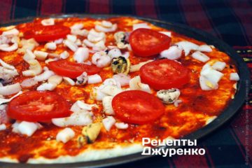 Шаг 6: Разложить помидор на пиццу