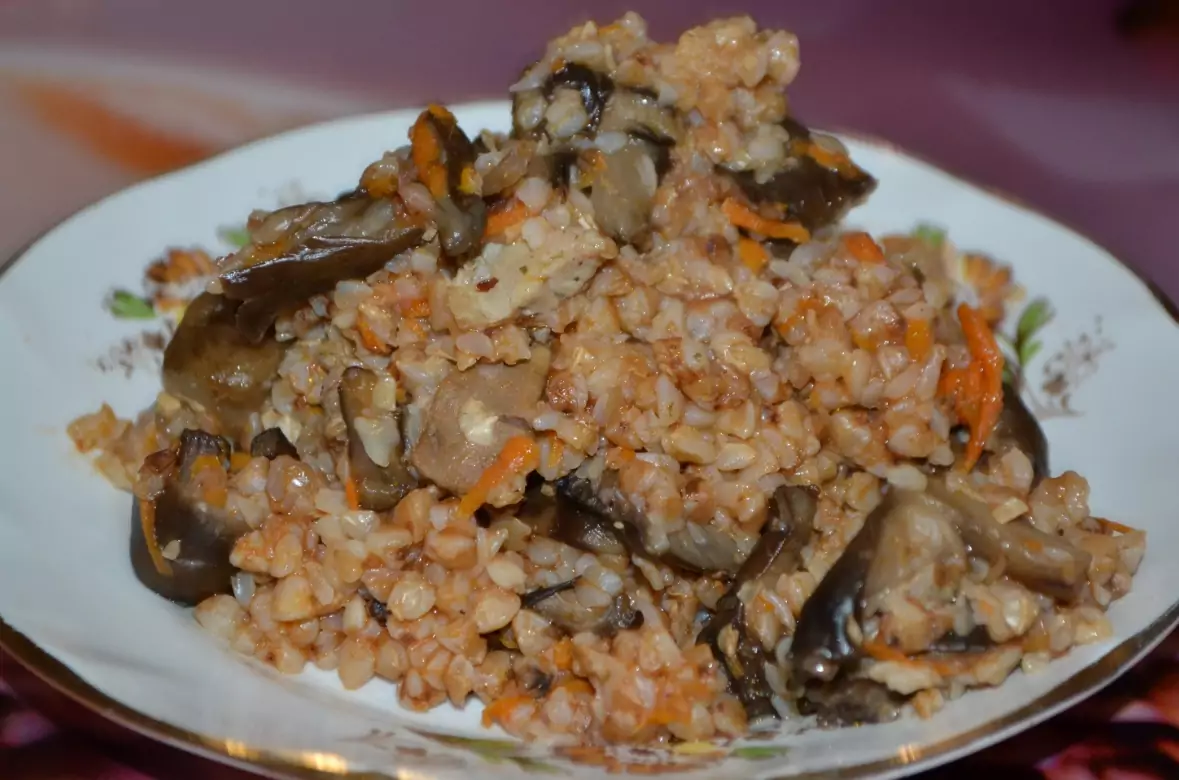 Рис с тушенкой и грибами в мультиварке